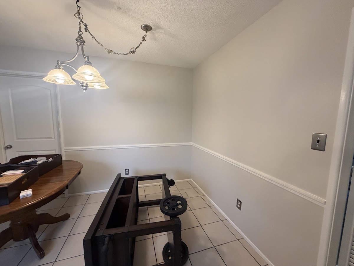 Dining room with two-tone painted walls
